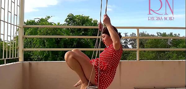 Cute housewife has fun without panties on the swing. Slut swings and shows her perfect pussy.